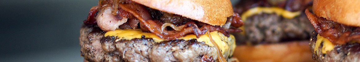 Eating Burger at Golden Ox Burger, Burritos restaurant in Fullerton, CA.